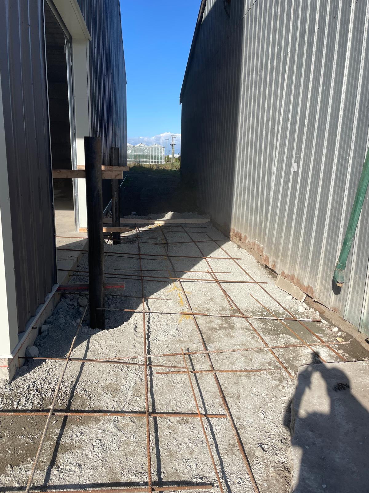 Rebar and foundation work between buildings